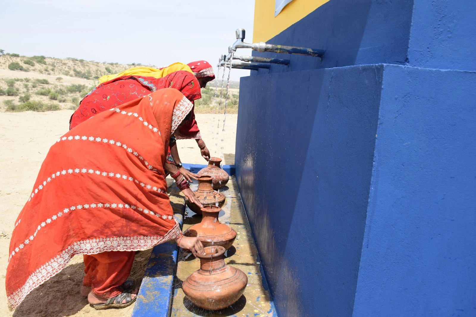 Filling up at a Droplets of Mercy water point